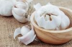 Garlic On Sackcloth Stock Photo