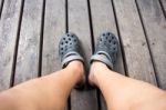 Shoes From An Aerial View On Wooden Background Stock Photo