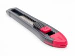 Black And Red Plastic Cutter Knife Isolated Stock Photo