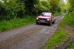 S. Mcgirr Driving Toyota Starlet Stock Photo