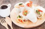 Fresh Spring Rolls On Wooden Table Stock Photo