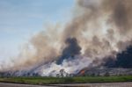 Burning Garbage Heap Of Smoke Stock Photo