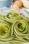 Traditional Italian Raw Homemade Spinach Pasta Stock Photo