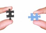 Holding A Blank Jigsaw Piece Stock Photo