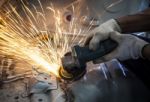 Worker Hand Working By Industry Tool Cutting Steel Stock Photo