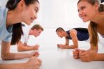 Young Multi Ethnic People Exercising In Gym Stock Photo