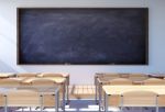 Empty Classroom Interior With Student Desk And Chairs Stock Photo