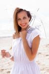 Caucasian Women With Umbrella Stock Photo