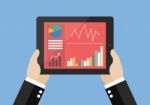 Hands Hold Tablet With Flat Simplistic Inforgraphic Charts On A Stock Photo