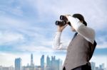 Businessman Using Binoculars Stock Photo