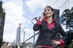 Portrait Of Business Woman With A Mobile Phone On Street Stock Photo