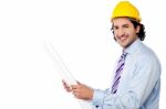 Male Architect With Construction Plan Stock Photo