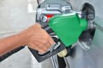 Man Pumping Gas In Tank Stock Photo