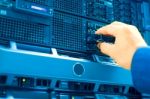 Man Fix Server Network In Data Center Room Stock Photo