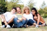 Family Having Fun In Countryside Stock Photo