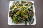 Mussels Steamed With Herbs And Lemon Grass -  Hot And Spicy Seafood Sauce , Thai Food Stock Photo