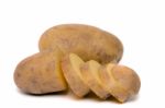 Sliced Potato And Whole Isolated On A White Background Stock Photo