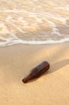 Help Bottle On Sea Shore Stock Photo