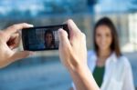 Young Couple Taking Photos With Mobile Stock Photo