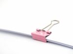 Pink Paperclip Attached On White Paper Isolated Stock Photo