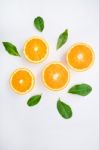 Fresh Orange Citrus Fruit On White Background. Top View Stock Photo