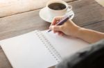 Hot Cup Of Coffee On Working Table Stock Photo