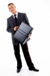 Businessman holding Briefcase Stock Photo