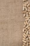 Peanuts On A Burlap Background Stock Photo