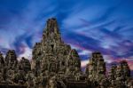 Ancient Stone Faces Of King Jayavarman Vii At The Bayon Temple, Stock Photo