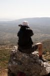 Man Sitting Outside And Enjoying In A View Stock Photo