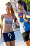 Group Of Young Women Doing Stretching In The Park Stock Photo