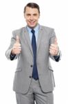 Handsome Executive Showing Double Thumbs Up Stock Photo