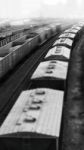 Vertical Black And White Toy Train Echelon Bokeh Background Stock Photo