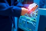 People Fix Node Fiber Optic In Network Room Stock Photo