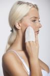 Woman Clean Face With Wet Wipes Stock Photo