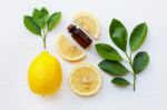 Fresh Lemon With Lemon Essential Oil Stock Photo