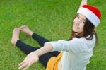 Beautiful Young Santa Clause Woman Stock Photo