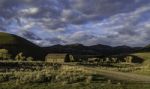 Barn On The Hill In The Morning Sun At Yellowstone National Park Stock Photo