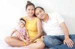 Happy Of A New Family On White Background Stock Photo