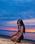 Beautiful Black African American Woman Posing On The Beach At Su Stock Photo