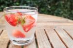 Close-up Glass Of Strawberry Infused Water Stock Photo