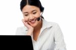 Help Desk Operator Communicating With Client Stock Photo