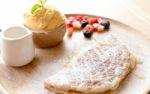 Fresh Dessert Soft Vanila Roti With Ice Cream ,syrup ,strawberry Stock Photo