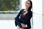 Beautiful Girl Looking At Camera In City Stock Photo