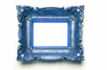 Blue Picture Frame On White Wall Stock Photo