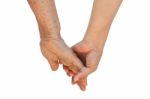 Old And Young Women Holding Hand Stock Photo