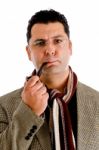 Male Holding Smoking Pipe Stock Photo