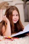 A Girl Doing Homework Stock Photo