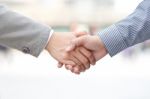 Businessmen Shaking Hands Stock Photo