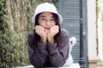 Thai Adult Girl White Cap Gray T-shirt Beautiful Girl Relax And Smile Stock Photo